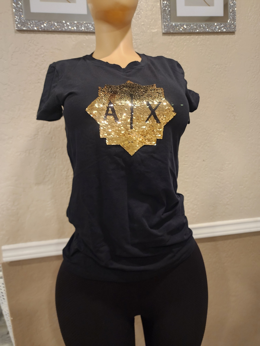 Armani Exchange Black Tee with Gold Sequin Emblem